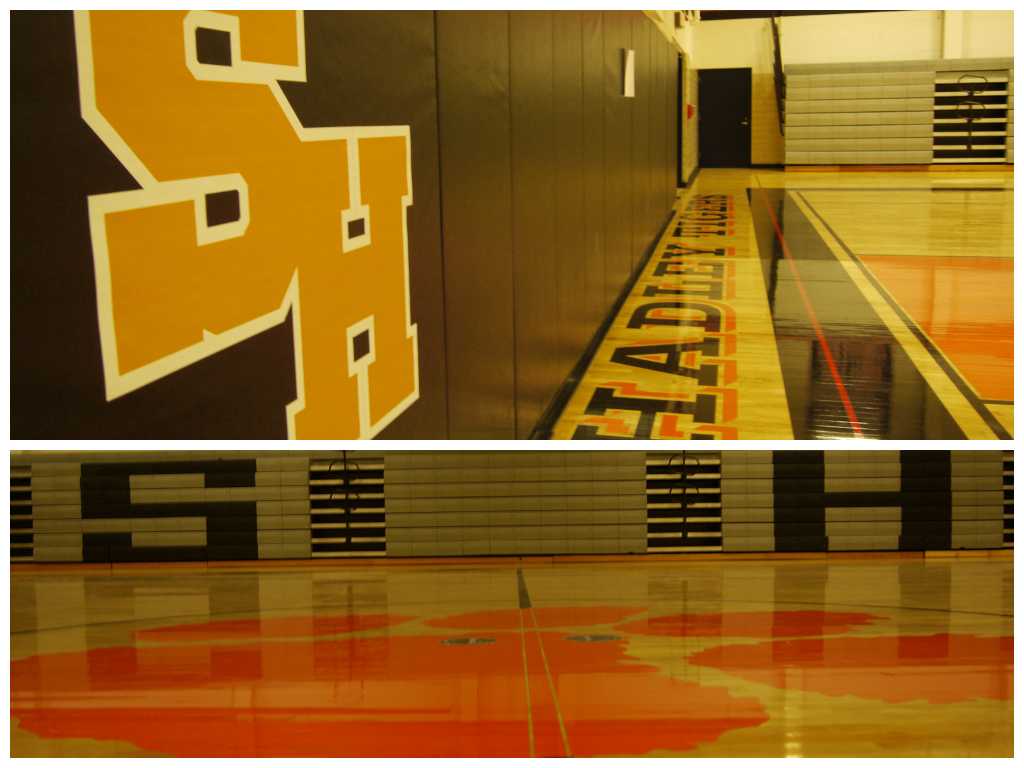The new gym is decked out with new mats detailed with an SH decal and an orange and black boarder along the perimeter. 