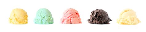 Assortment of ice cream scoops isolated on a white background. Lemon, mint, strawberry, chocolate and vanilla flavors.