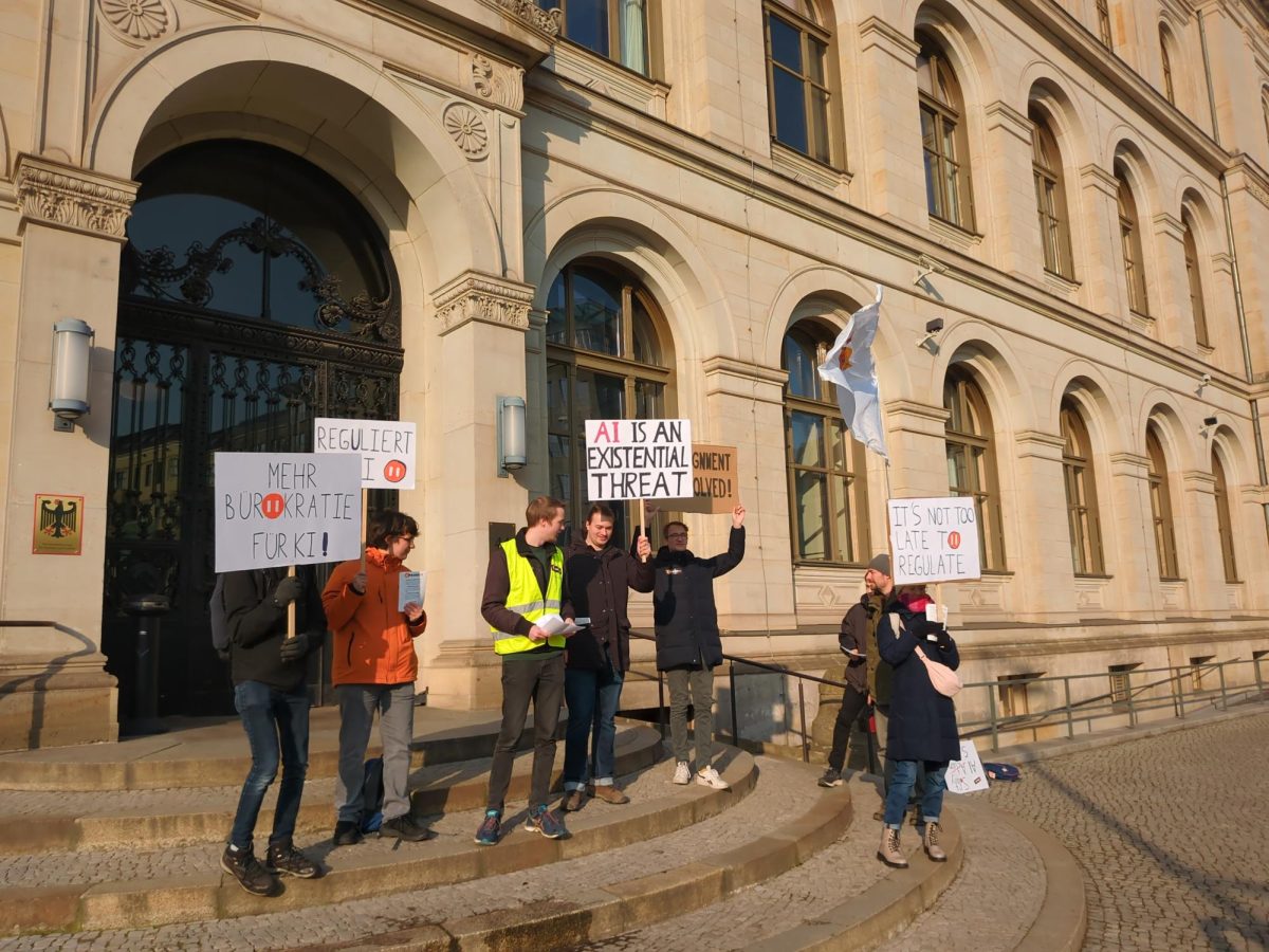 People protesting against AI in Grand Palais Paris