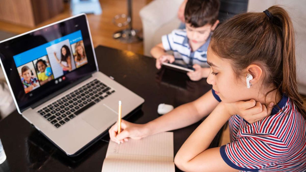 A student uses a laptop to attempt to learn online.