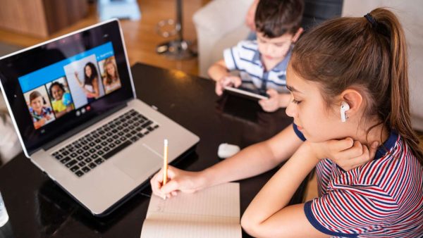 A student uses a laptop to attempt to learn online.