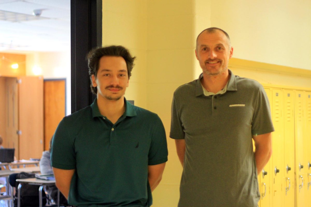 Mr. Frank and Mr. Balut Sharing a good moment together outside Mr. Frank's class.